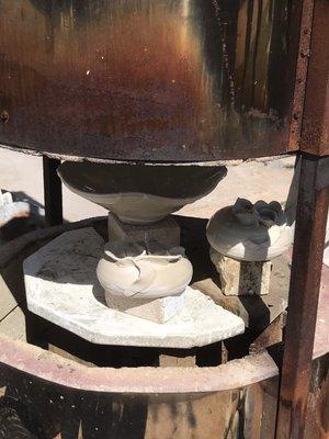 Outside raku firing.