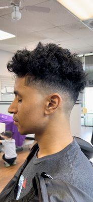 Curly top drop fade