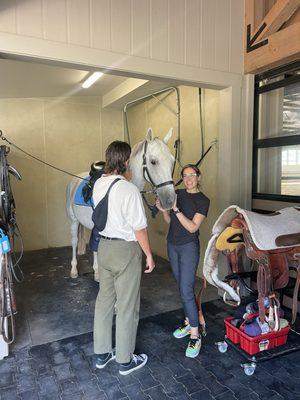 Tack area and wash rack next to arena and the tack carts!