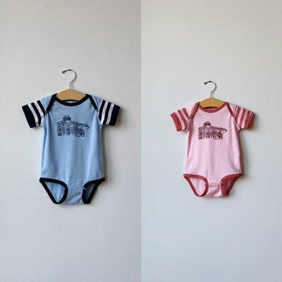 Have we got onesies for you... these two 'sailors' onesies feature AP's Carousel.