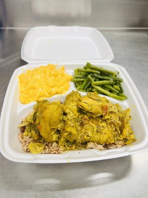 Curry chicken over rice & beans, with green beans and Mac n cheese