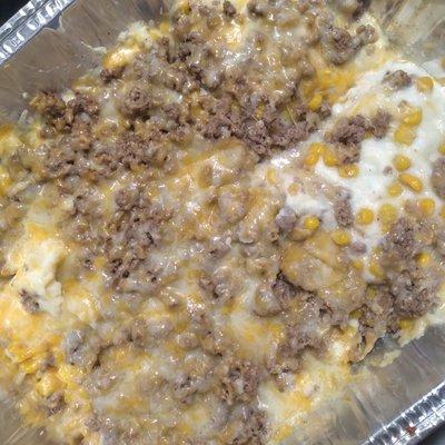 Sheppard pie with  sweet corn mashed potates and ground beef and coby jack cheese