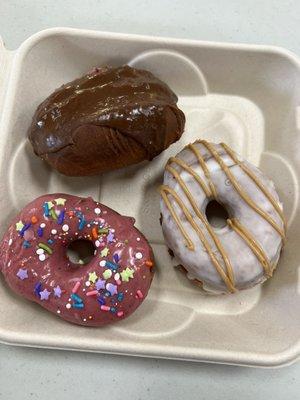 Boston cream, berry blast, and fluffer nutter vegan donuts.