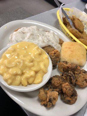 Country fried steak with Mac n cheese and fried mushrooms