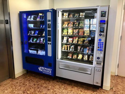 School Supplies (left) and Snacks (right) vending machine.