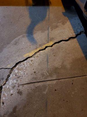 Uneven cracked sidewalks throughout The Fountains Apartments, 5001 Chicago Ave., Lubbock, Texas.