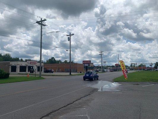 View from Dollar General toward fast pace urgent care clinic in Walgreens