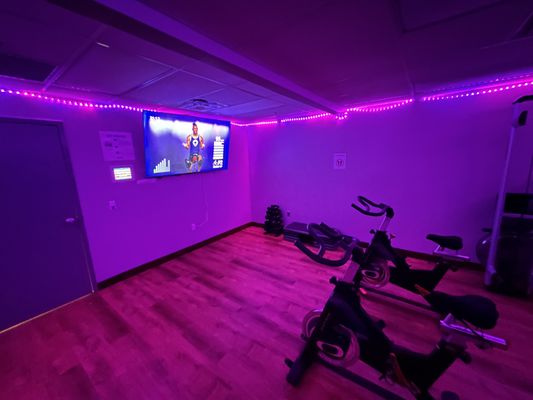 Fitness On Demand room. Over 700 classes of categories including yoga, cycling, HIIT, kick boxing, etc.