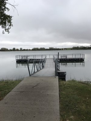 Fishing pier with picnic benches or gutting stations