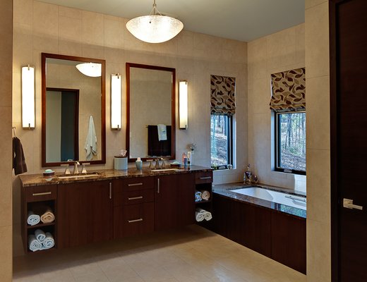 Granite vanity top and tub surround for a home in Greenville.