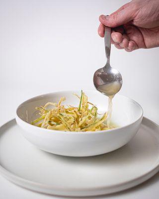 Potato Dumplings with Fried Leeks and Smoked Potato Broth