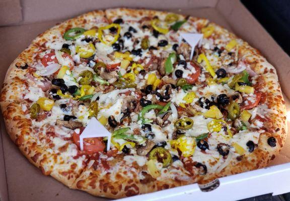 EVERYTHING Pizza. Similar to a Supreme pizza + Ham, Bacon, Pineapple, Jalapenos, Banana Peppers. ** pretty good **