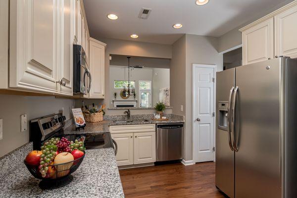 DO STAGE LLC Vacant Staging Kitchen area of this townhome.