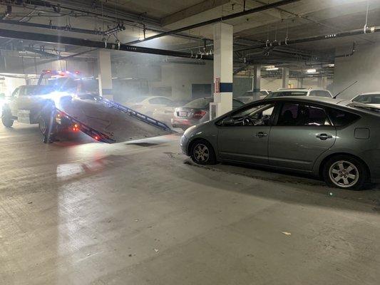 I had to go through a lot getting the car towed out of my parking garage. All the smoke is coming from the engine and exhaust.