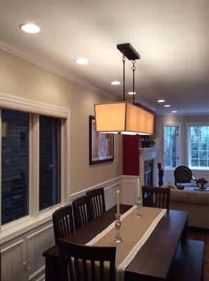 Installed light fixture and 6" can lights