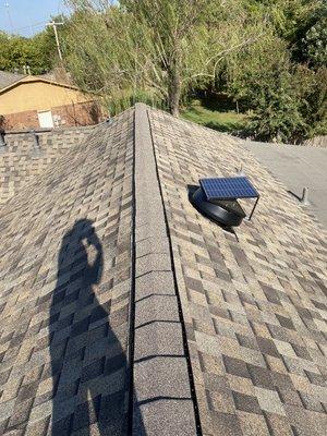 New Class 4 Impact Resistant Roof With High Profile Ridge and Ridge Vent along with a new Solar Powered Vent.