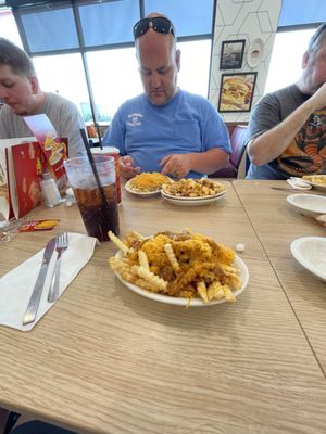 Chili cheese fries with a coke