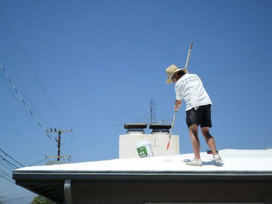 Jim Finley applying the liquid roof system