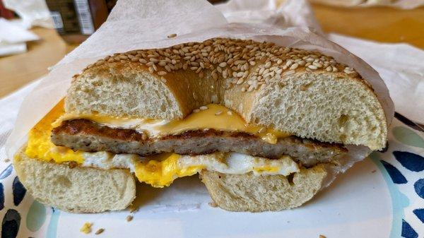 Sausage, egg, & cheese on a sesame seed bagel