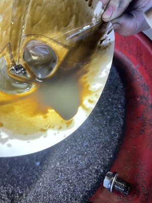 Engine oil that was too thick to make it through the sifter. When holding a magnet close to the stream of oil.. it altered the stream !