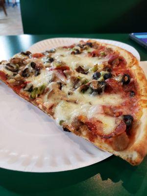 Two slices of Supreme Pizza Pie