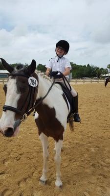 One of our riders at a horse show! Great job representing The Red Ranch!