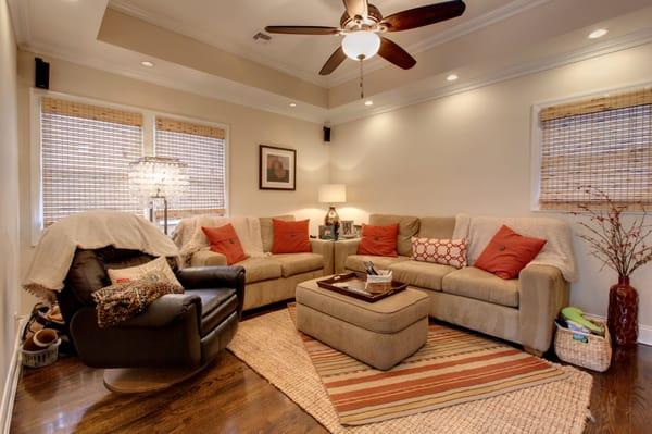 Beautiful living room with tray ceiling.