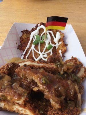 Mushroom gravy to die for!  Jaegerschnitzl Plate with fried potato pancake (including applesauce & sour cream)