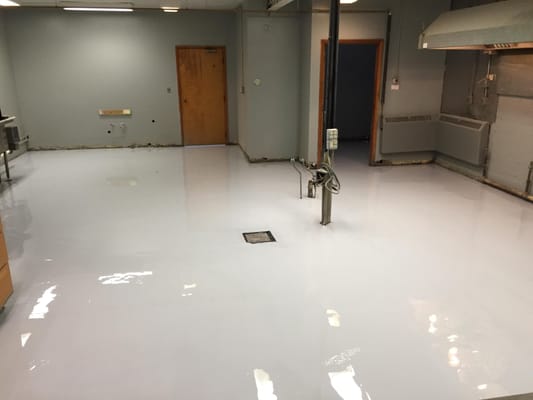 Not decorative, but beautiful just the same  The crew put down this bulletproof 3 coat epoxy/urethane floor for a church's ki...