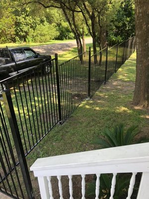 New Installation of a Wrought Iron Fence.