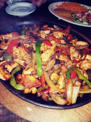 Texas fajitas for 2 steak, chicken, and shrimp.yumo