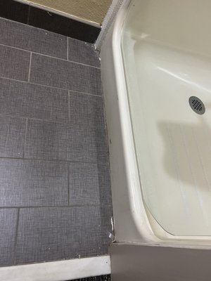 Dirty floors in bathroom.