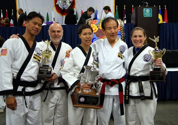 World Champions pictured with Grandmaster Shin and Master Gordon.