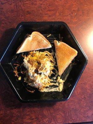 Sausage & Gravy Stuffed Hash Browns... Thankfully the toast wasn't burnt.