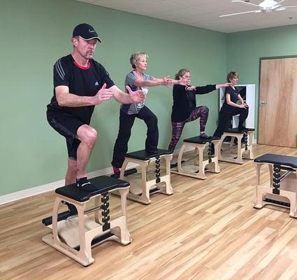 Lunges on the chair with varying spring tension will challenge your balance and strength.