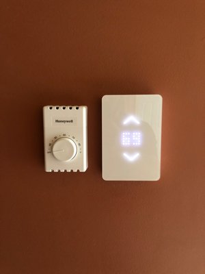 Smart thermostat to control one set of electric baseboards, "dumb" Honeywell one to control the less frequently used baseboards.