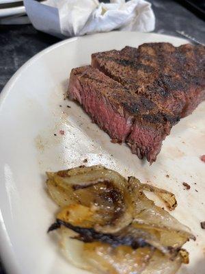 I had to sop up all of the blood onto napkins to try a piece of steak...