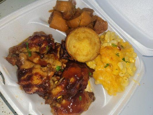 Honey glazed jerk bbq wings w/ bake mac, candied yams, Sweet honey cornbread.