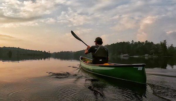 Sunset paddle in a Swift Pack Canoe