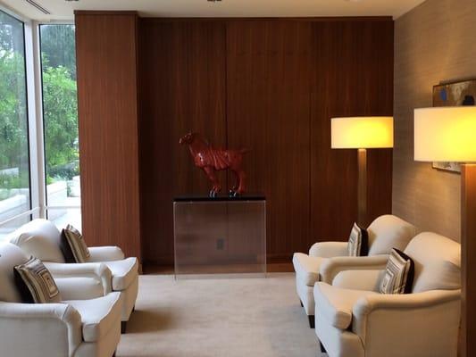 Floor-to-ceiling custom built and finished walnut panels 200 Patterson