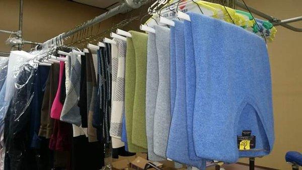 Sweaters dry cleaned, steamed, pressed, and finished with paper wrapping to prevent static