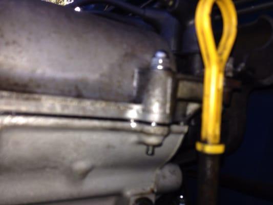 This is the valve cover leaking oil after this car got rebuilt motor from Sparks .