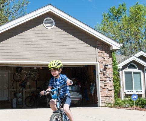 When you're 7, remembering to shut the garage door can be tough. Close it from anywhere using ADT Pulse.