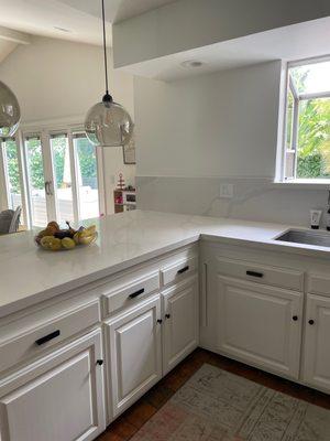 Kitchen all cabinetry and walls painted (were previously yellow/brown)