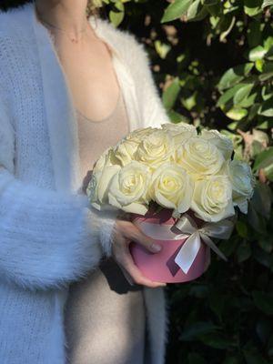 Flower box with pure white roses