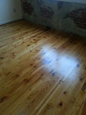 Restored and refinished this vintage pine floor.  Glows with new life!