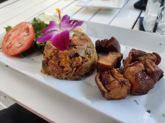 Mofongo de chicharron / pork belly $11 plus extra chicharron on the side which I didn't ask for and yet was charged $14 extra for.