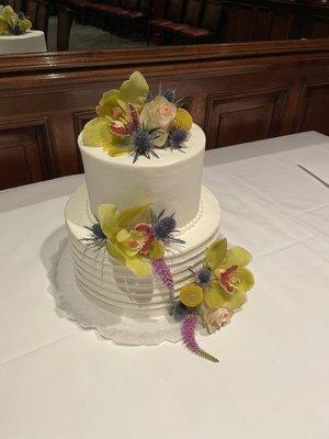 Delectable !  Chocolate layer cake filled with ganache, White layer cake filled with fresh strawberries.  Flowers : Sequoia Plaza Flowers