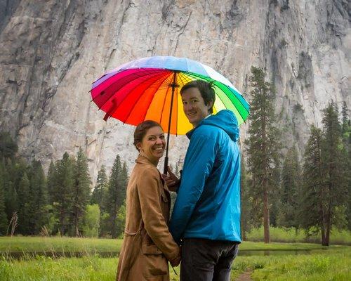 A little rain on the wedding day brings some good luck and rainbows.