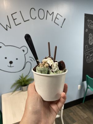 Mint rolled ice cream with Oreos, cookie dough, brownie pieces whipped cream and pocky!